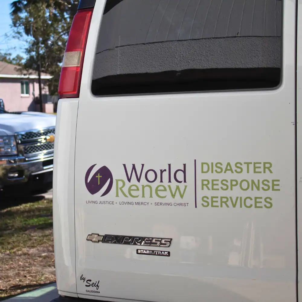 World Renew disaster response vehicle used to transport volunteers, tools, and equipment.