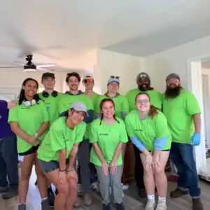 World Renew disaster response volunteers serving at a rebuilding site.