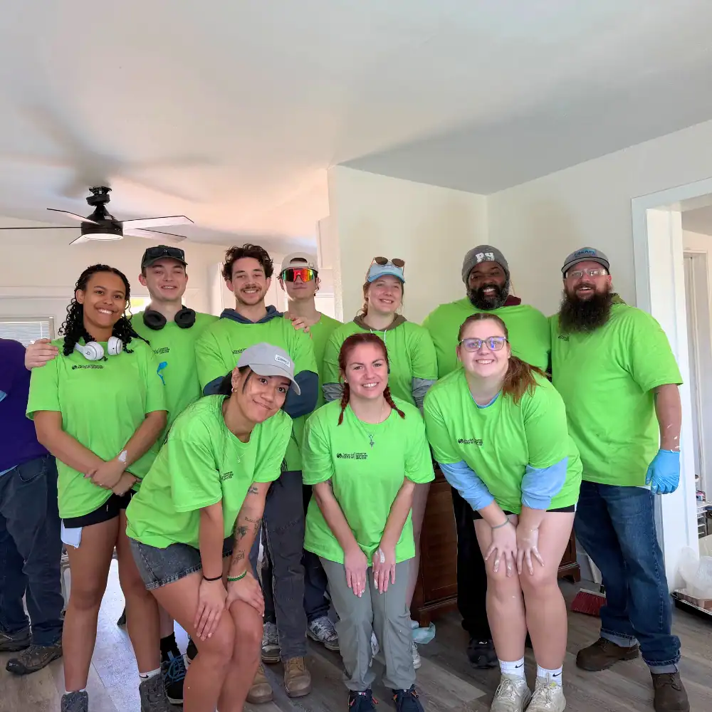 World Renew disaster response volunteers serving at a rebuilding site.